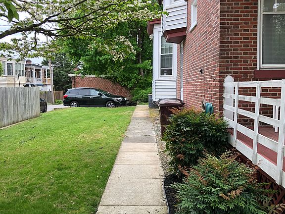 Side yard with first come first served two (2) off street parking spots available for lease