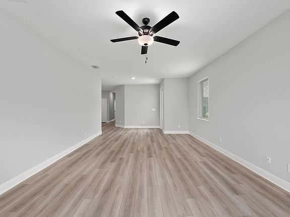 The family room is spacious and offers plenty of natural light