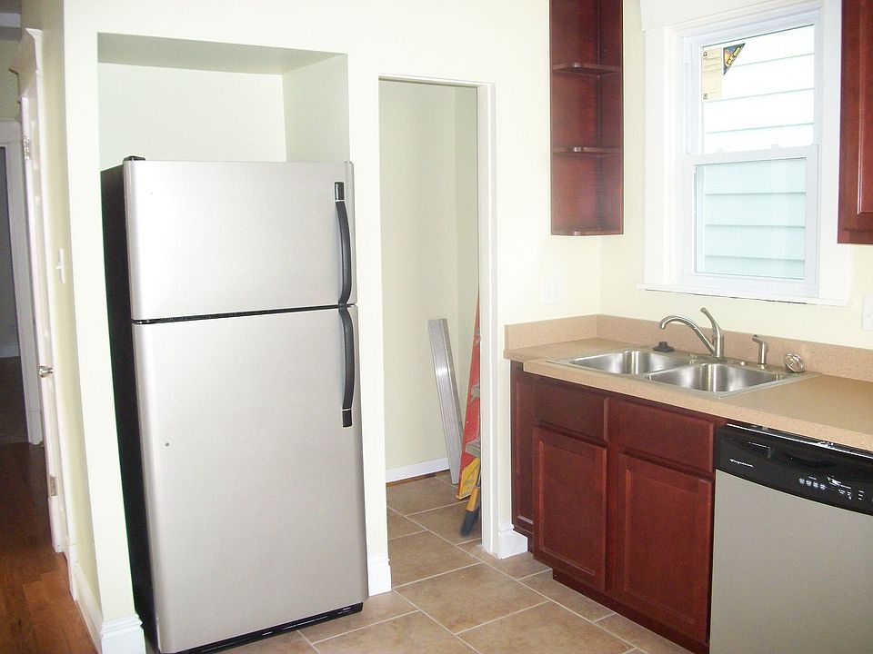 Walk-in kitchen storage. Dual lighting