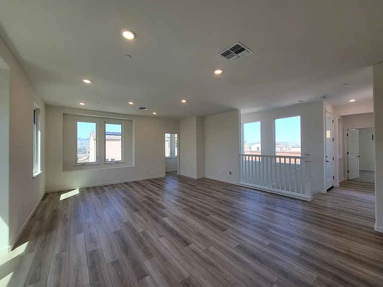 Open layout Family and Dining with large windows