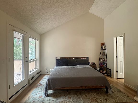 master bedroom suite. The balcony is on the left and bathroom on the right