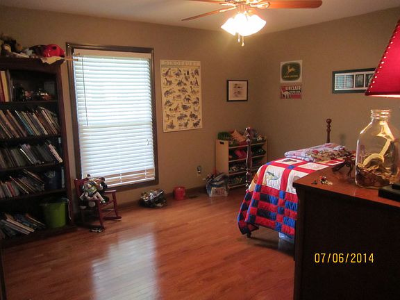 Bedroom with hardwood