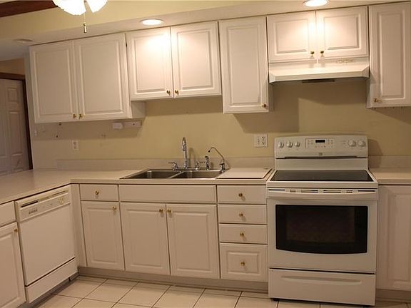 Plenty of storage with all the cabinets. Dishwasher blends in.