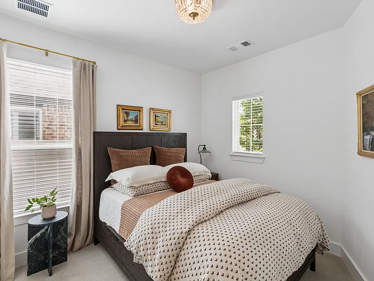 First floor bedroom with queen sized bed. Walk-in closet.