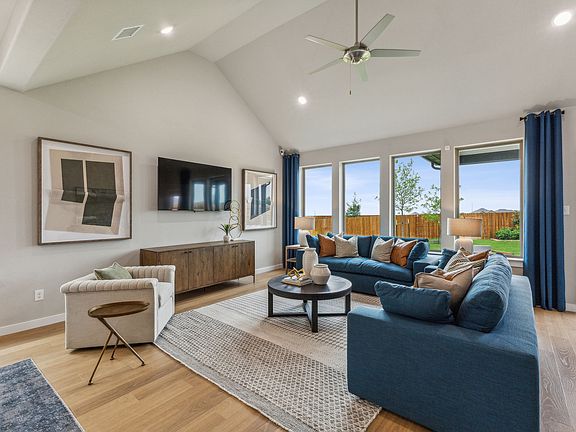 Living Room in the Stanley II home plan by Trophy Signature Homes - REPRESENTATIVE PHOTO