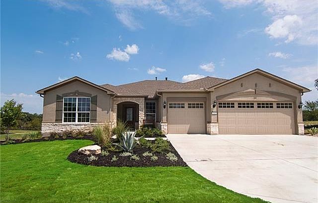 Front Exterior. Photo of Model Home with same Floor Plan, Not of