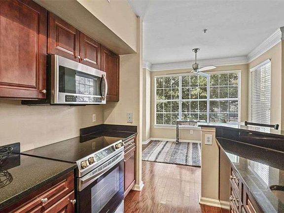 4th image of 200 Renaissance Pkwy NE APT 206
