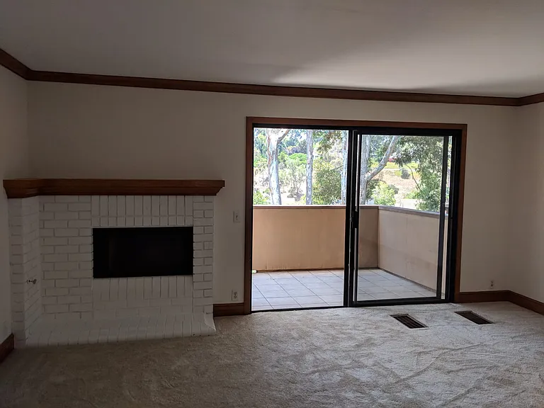Living room with private green belt views