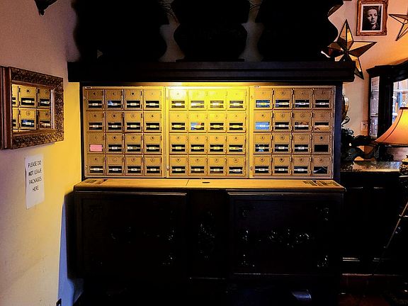 Vintage mailboxes with outgoing mail.