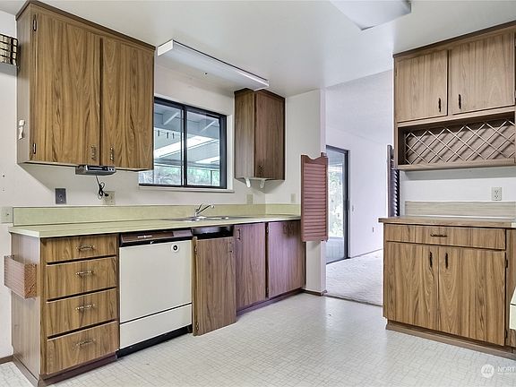 2nd view of kitchen; 2nd set of patio doors to your sun room on the left.>