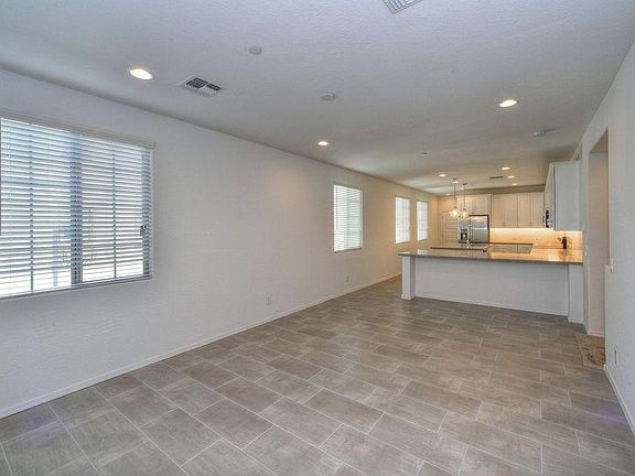 Large great room with 24 x 12 tile