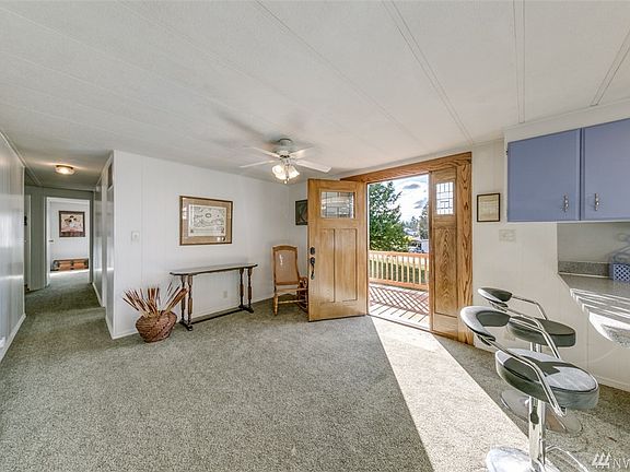 Entering the home from the front deck into the foyer.  