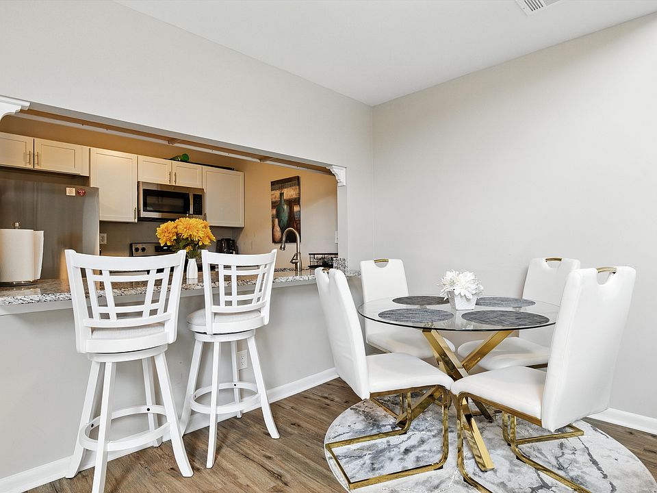 Large kitchen island with quartz luxury top.