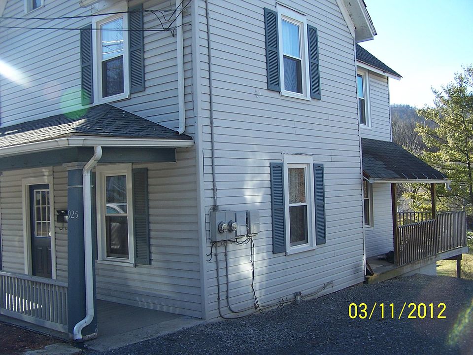 Off street parking, deck overlooking the back yard with pleasant views.