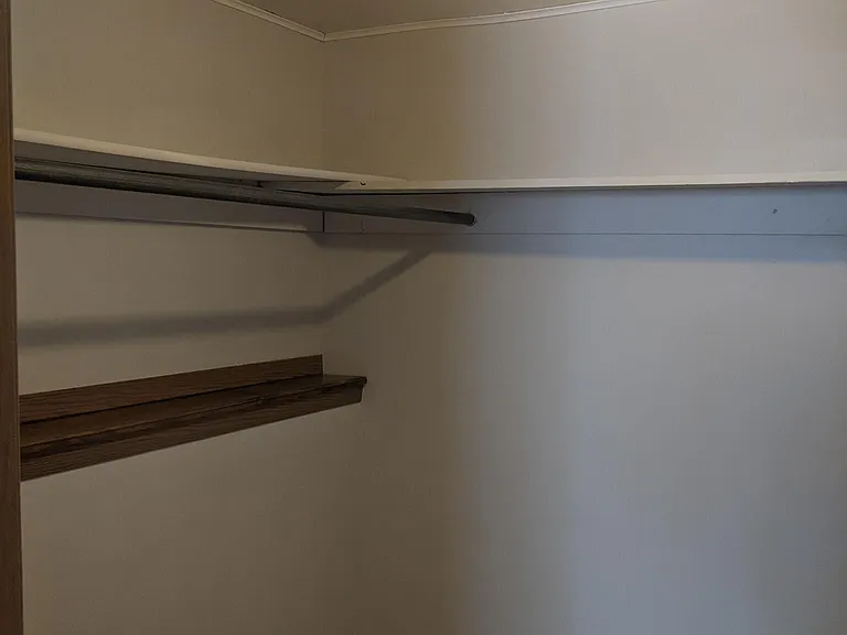 Large walk in closet downstairs bedroom 6' x 8'