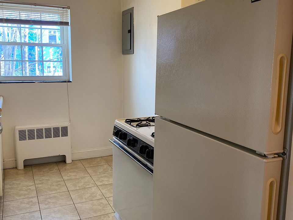 Galley kitchen will fit a hightop table. Dining room is adjacent to the kitchen with ample room for a dining table & chairs or office area.