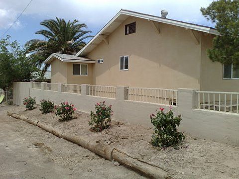 Side of the house, all landscaping on auto watering system