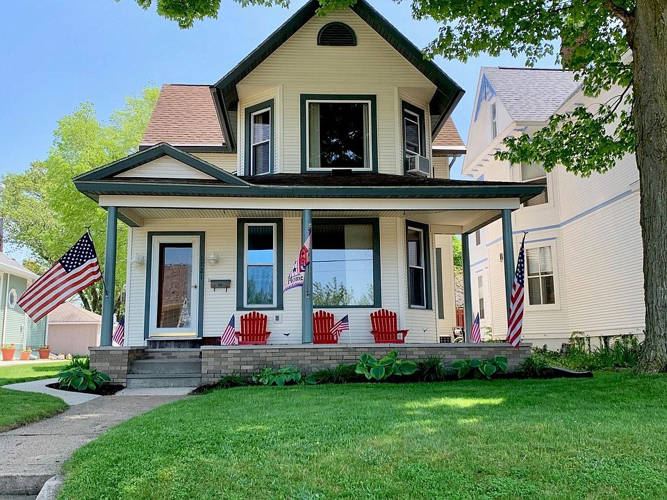 Front of home with large front porch to watch sunsets and fireworks from!