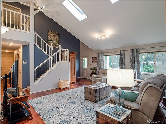 Soaring ceiling and tons of natural light. Custom biult shades for these skylights included. Beautiful Brazilian Cherry hardwood flooring.