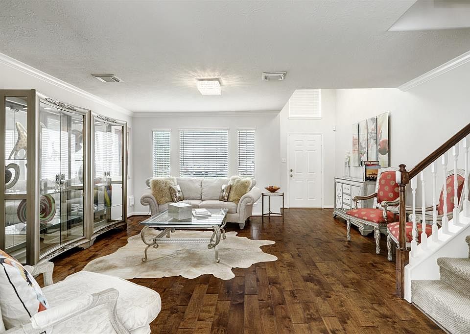 Stunning home ready for new owners features gleaming hardwood floors throughout main living areas!