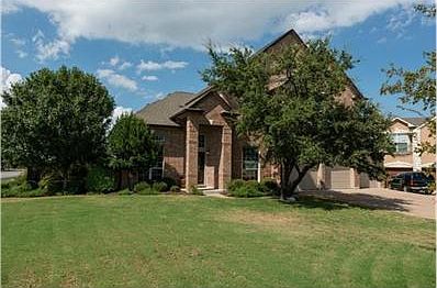 Fantastic treed front yard on a corner lot