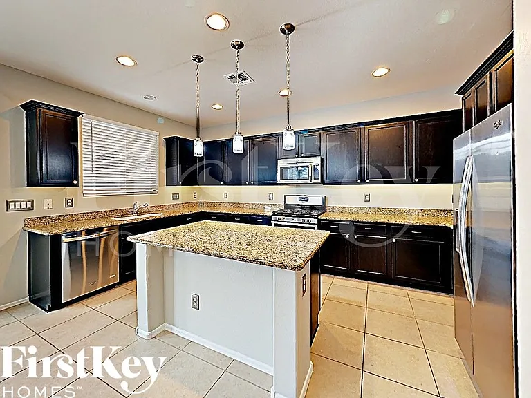 12061 W Rowel Rd — Photo 3
