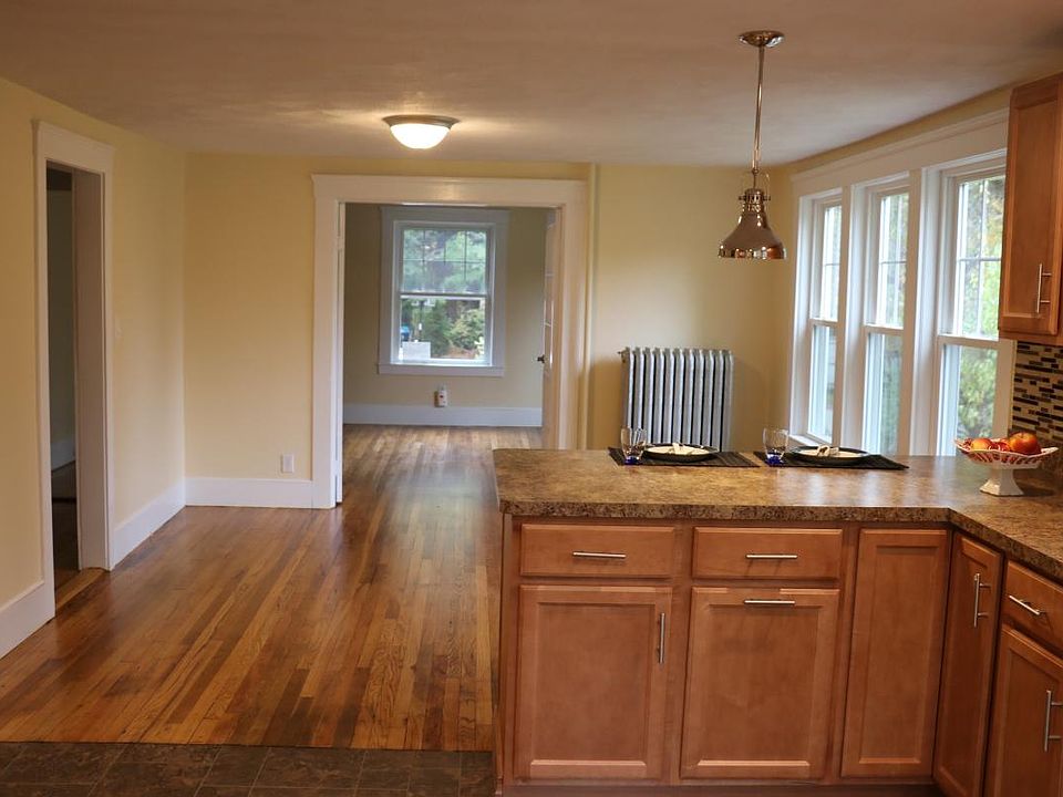 Open adn sunny with bar and open floor plan