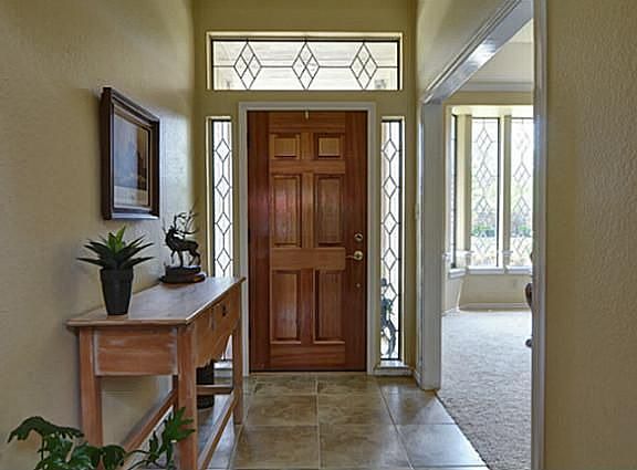 Front Door has Gorgeous Leaded Glass Transom and Sidelights!