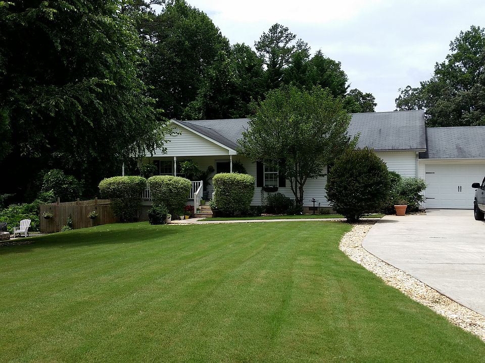 Lush green yard with rock accents