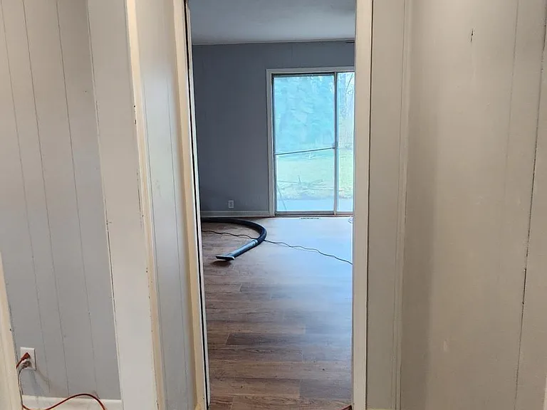 Entrance from the garage to the Den. To the left of the hall there is a small room I call the study room. You can use it for whatever.