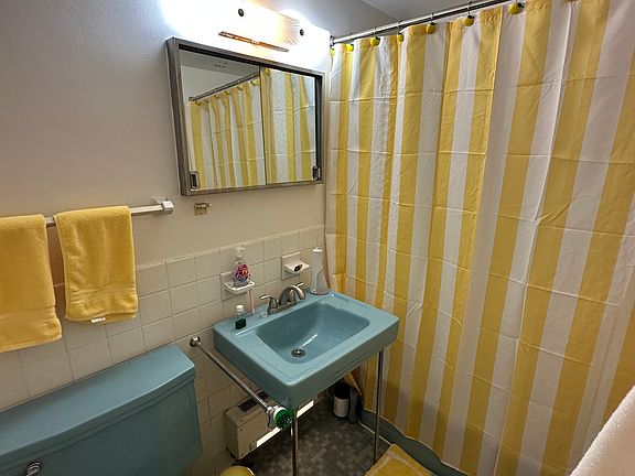 cheery retro bathroom with bidet!