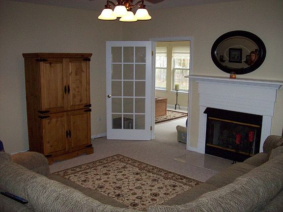 17x16 Cozy Step-down Family Room w/Gas log fireplace.