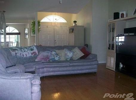 Open Great Room with Wood Burning Fireplace!