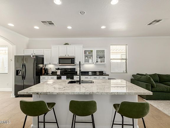 5th image of 10768 W WOODLAND Avenue