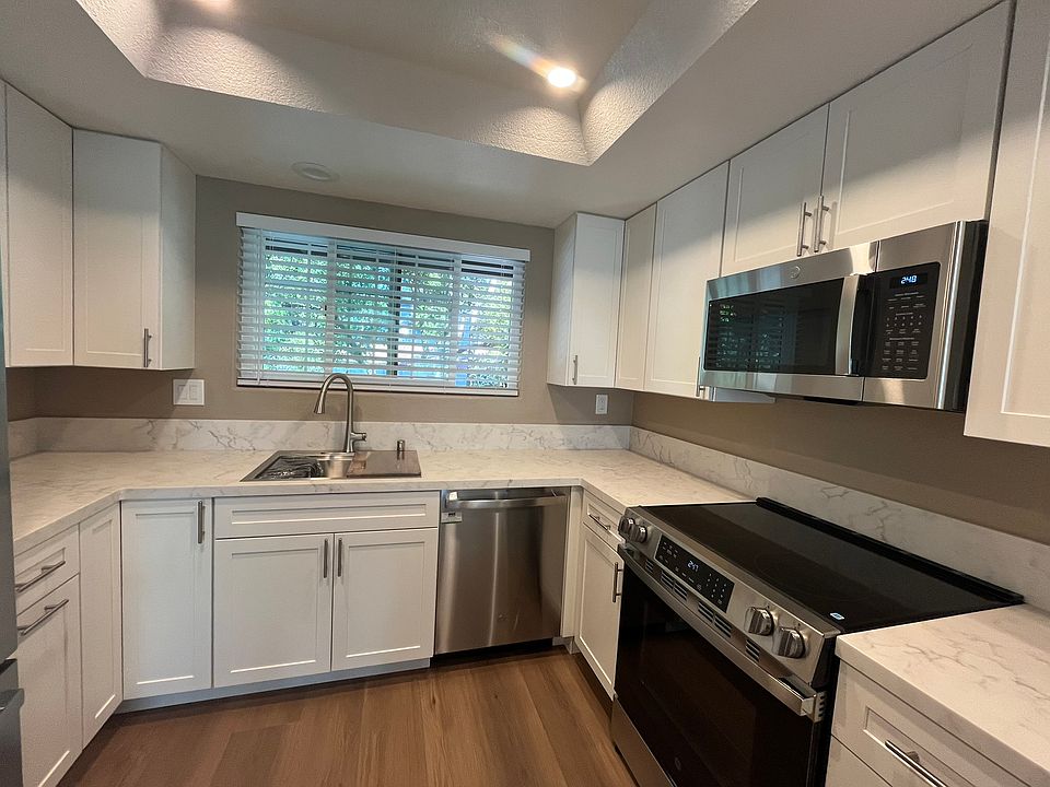Quality remodeled kitchen with custom cabinetry that maximizes storage.