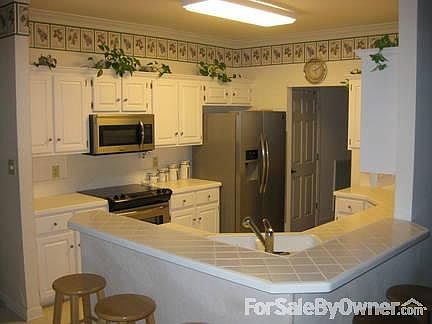 21 ft built-in oak cabinets