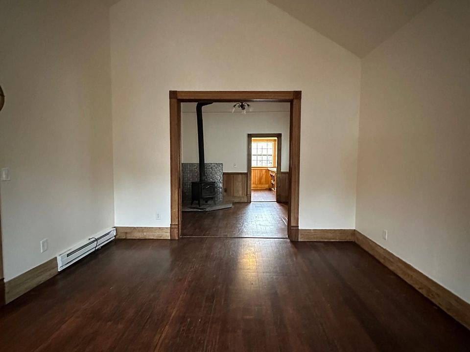 Living room with pocket doors to dining room open