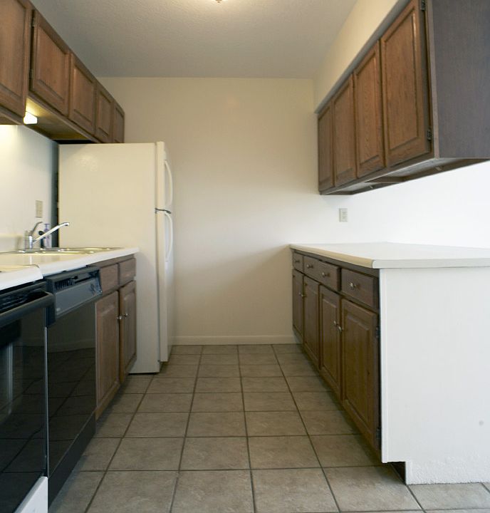 Enjoy cooking? Kitchen features beautiful terra cotta tiles and plenty of cabinet space