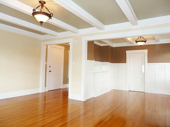 Hardwood Floors, Boxed-Beam Ceilings.