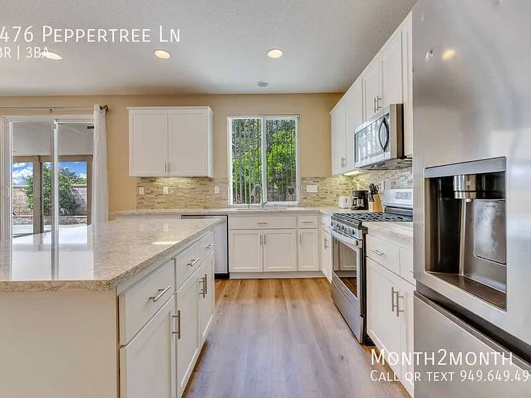 7476 Peppertree Ln — Photo 16