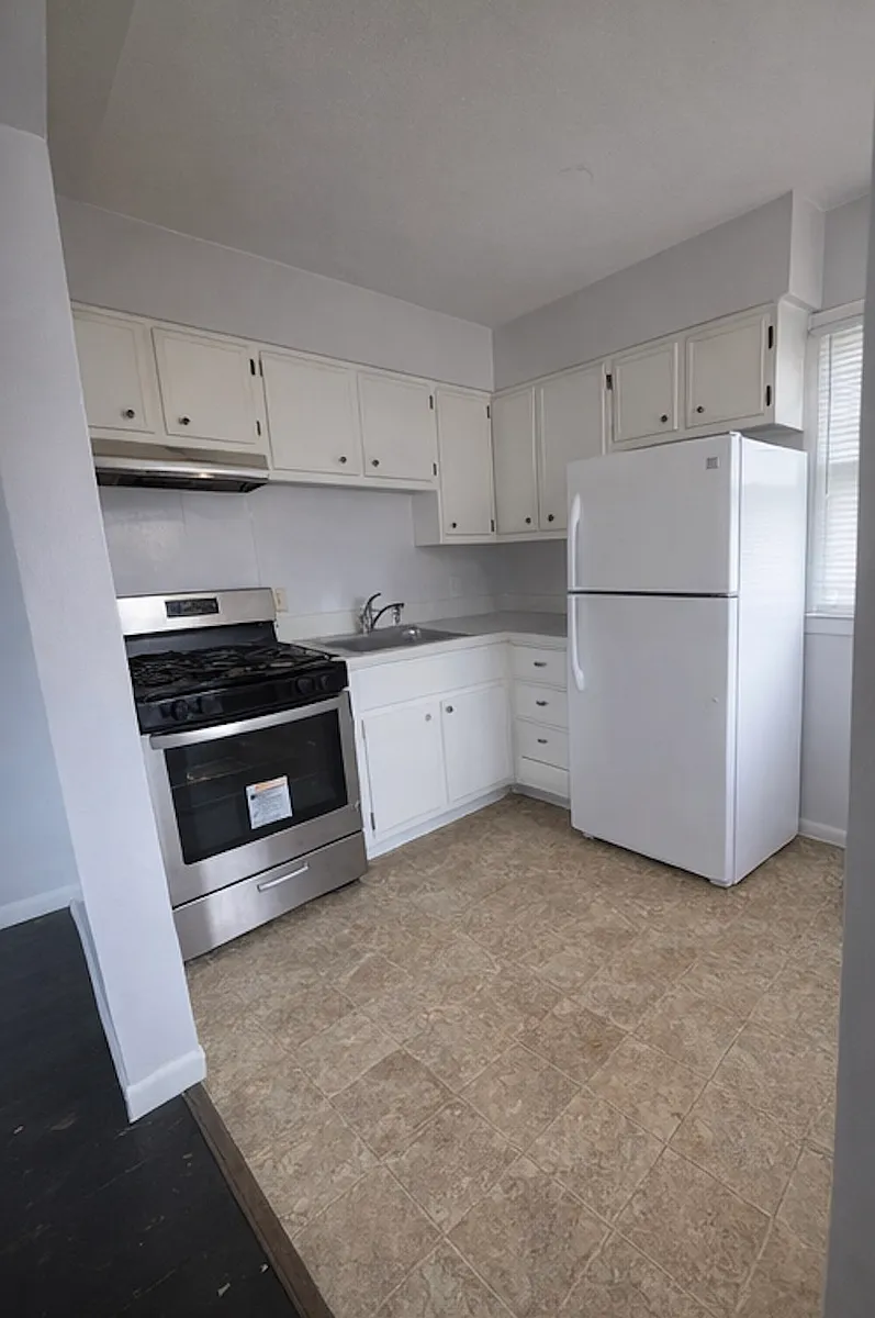 Building Photo - 5003 Woolworth Ave #8