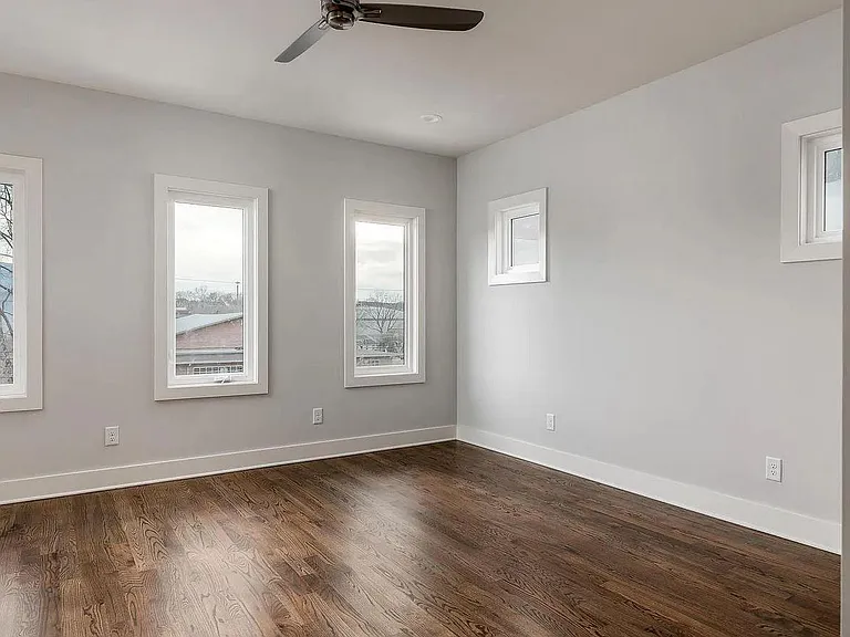 Master Bedroom (updates feature plantation shutters throughout)