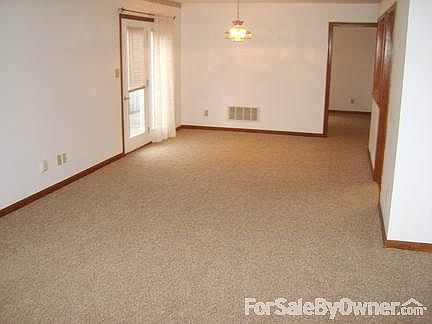 Far end of great room. New carpet and fresh paint throughout.