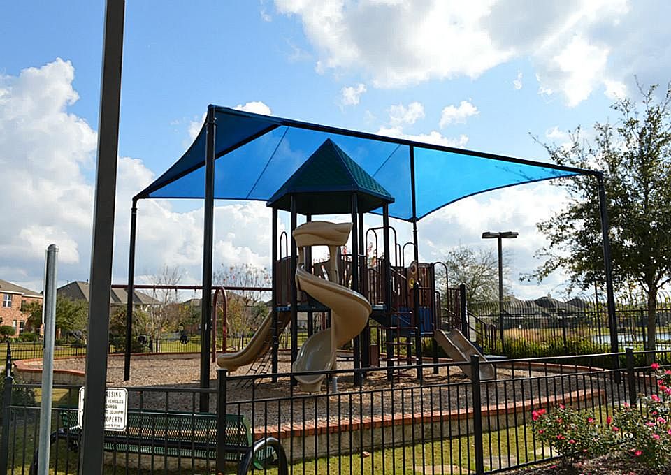  WHAT FUN! A Covered Playground for the Kids Right Here in the Neighborhood!