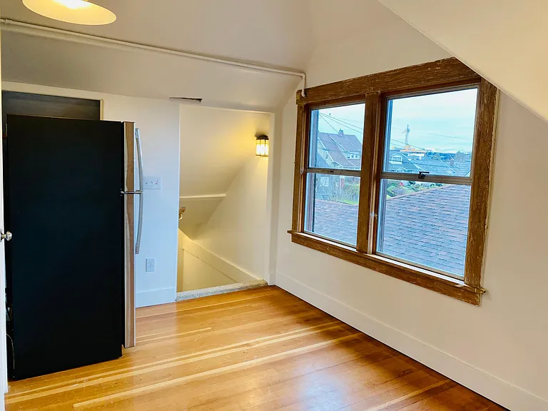 looking back from kitchen to private stair