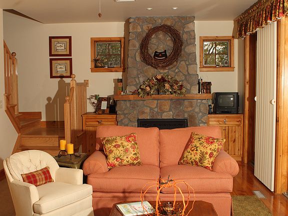 Living Room showing stone French style propane F/P