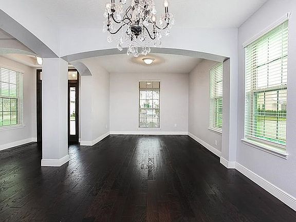 Formal dining room looking to the formal living room.