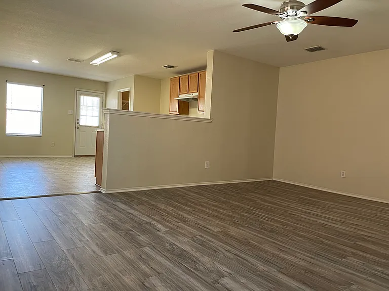 Upgraded floor with fresh paint and open floor plan.