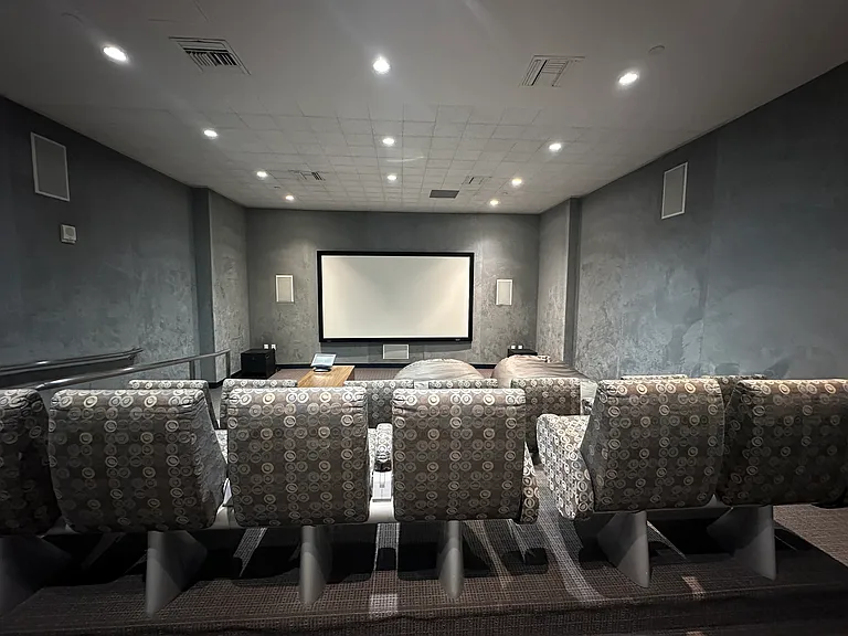 Theater across the hall from unit.