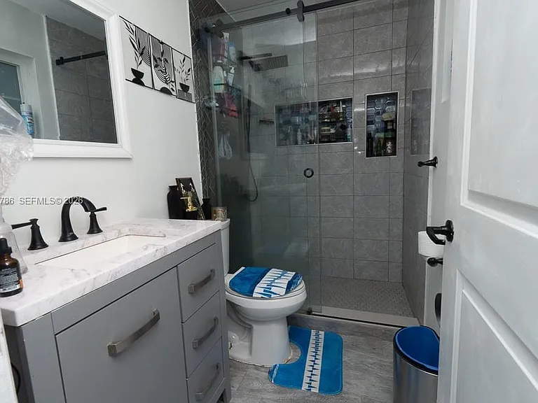 5941 NW 14th Ct — Photo 31